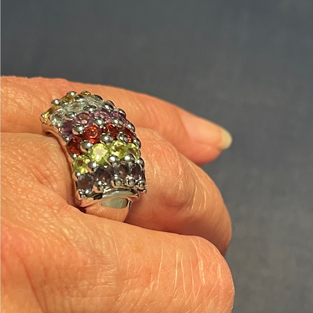 925 multi gemstone ring. I believe stones are genuine. 5.75 to size 6. See pix.